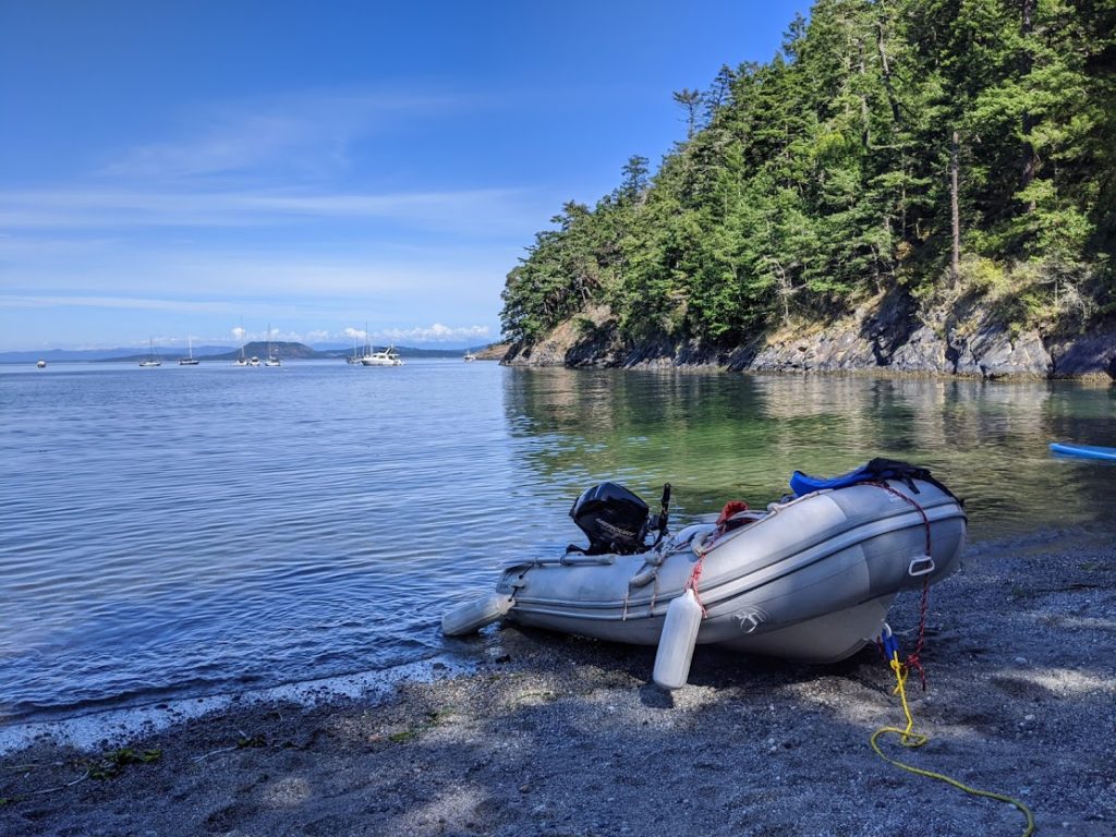 Our Zodiac dinghy beached at Watmough Bay after an easy beach landing on Lopez Island in the San Juans