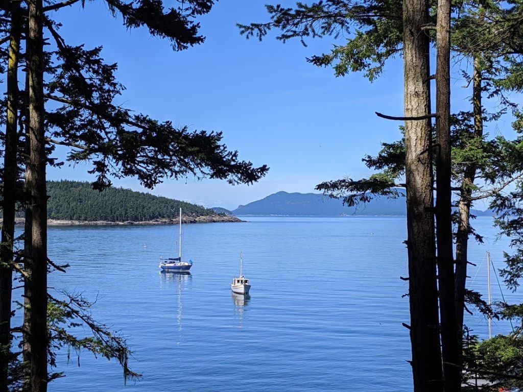Our sailboat Mosaic, a Fuji 40, at anchor in Watmough Bay in July summer 2020 - Islands to visit by boat in the San Juans