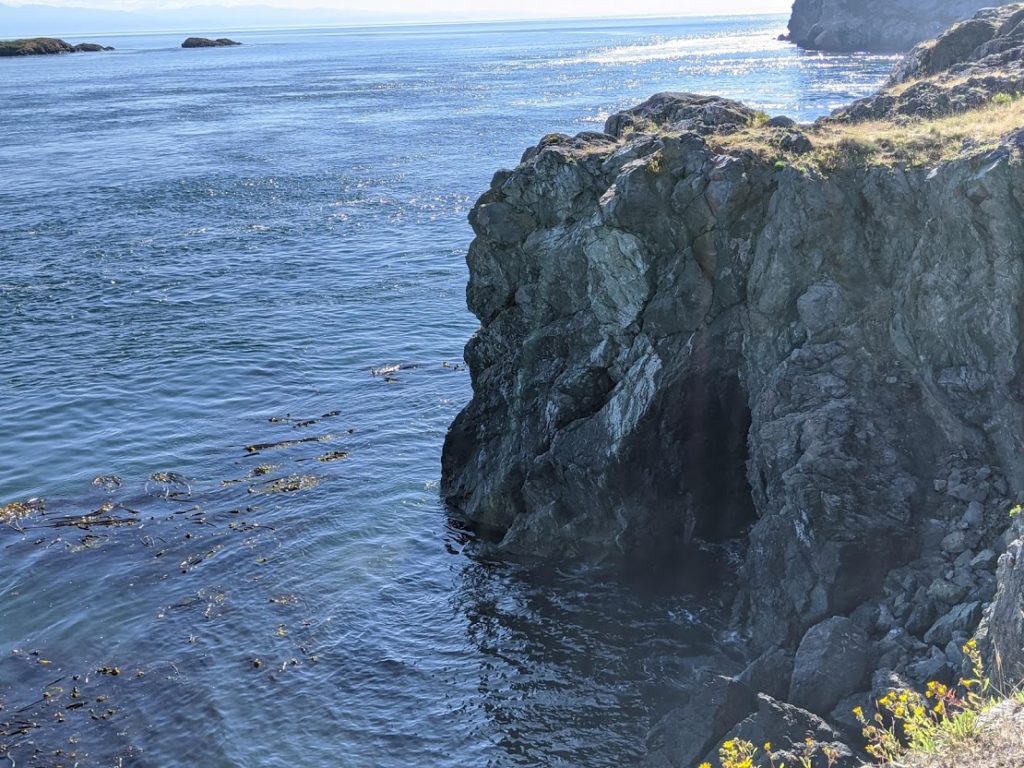 A sea cave along a cliff wall at Point Colville on Lopez Island - a nice hike from Watmough Bay when visiting by boat
