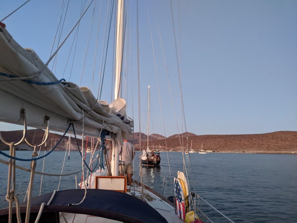 Cruising Meraki towing SV Mosaic Voyage into safe anchorage