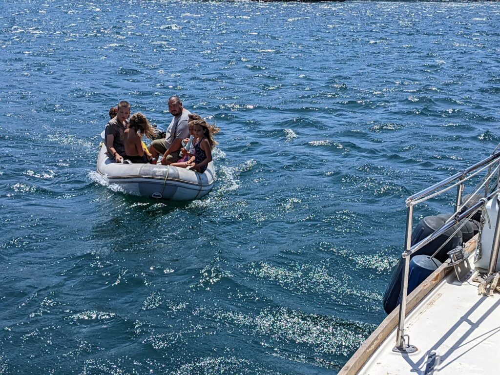 Boat kids marauding from boat to boat in the anchorage while cruising baja in the summer of 2022
